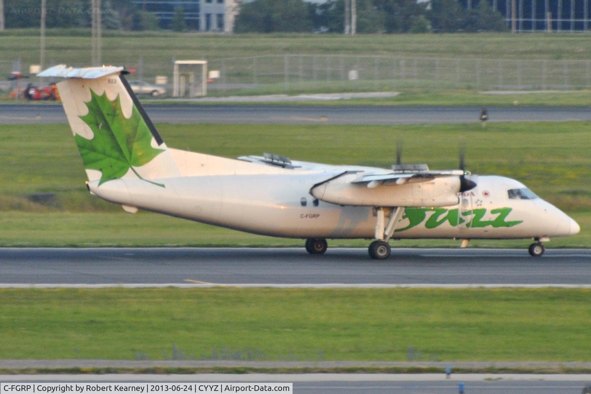 C-FGRP, 1990 De Havilland Canada DHC-8-102 Dash 8 C/N 207, Rolling out after arrival
