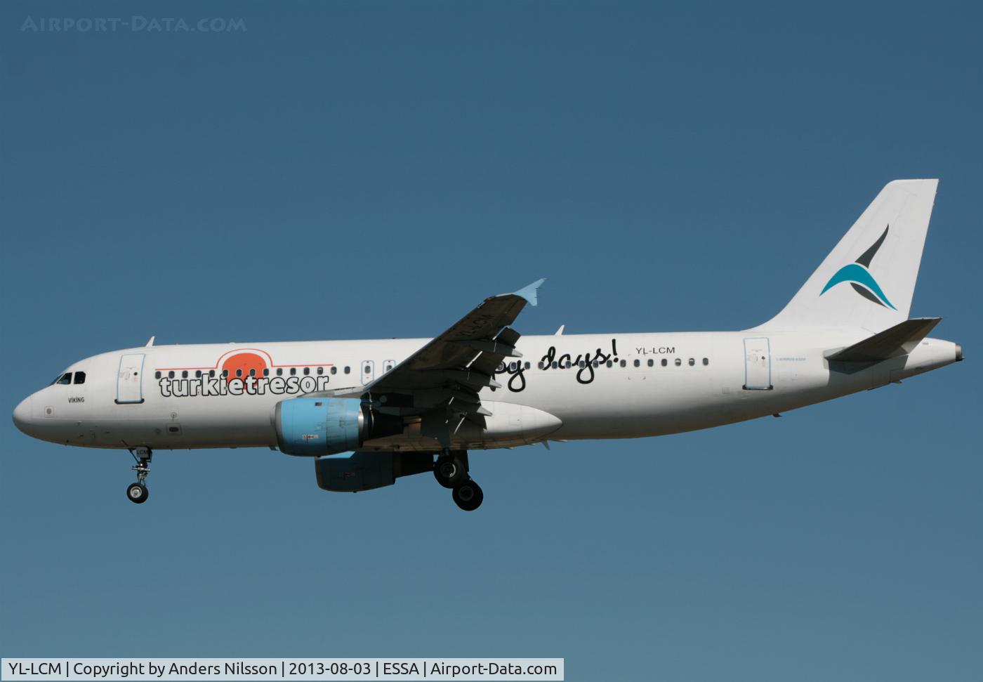 YL-LCM, 1991 Airbus A320-211 C/N 244, On short final for runway 26.