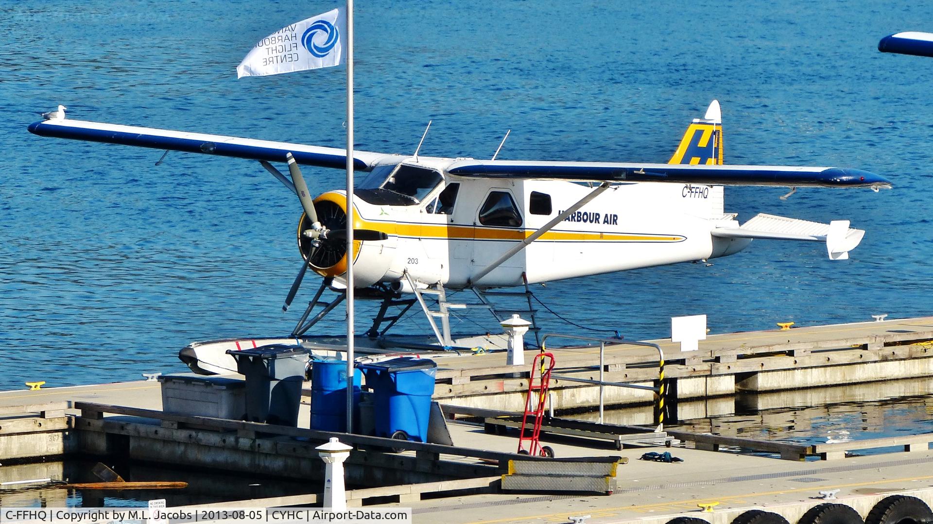 C-FFHQ, 1949 De Havilland Canada DHC-2 Beaver Mk.1 C/N 42, Harbour Air #203 docked at Coal Harbour terminal.