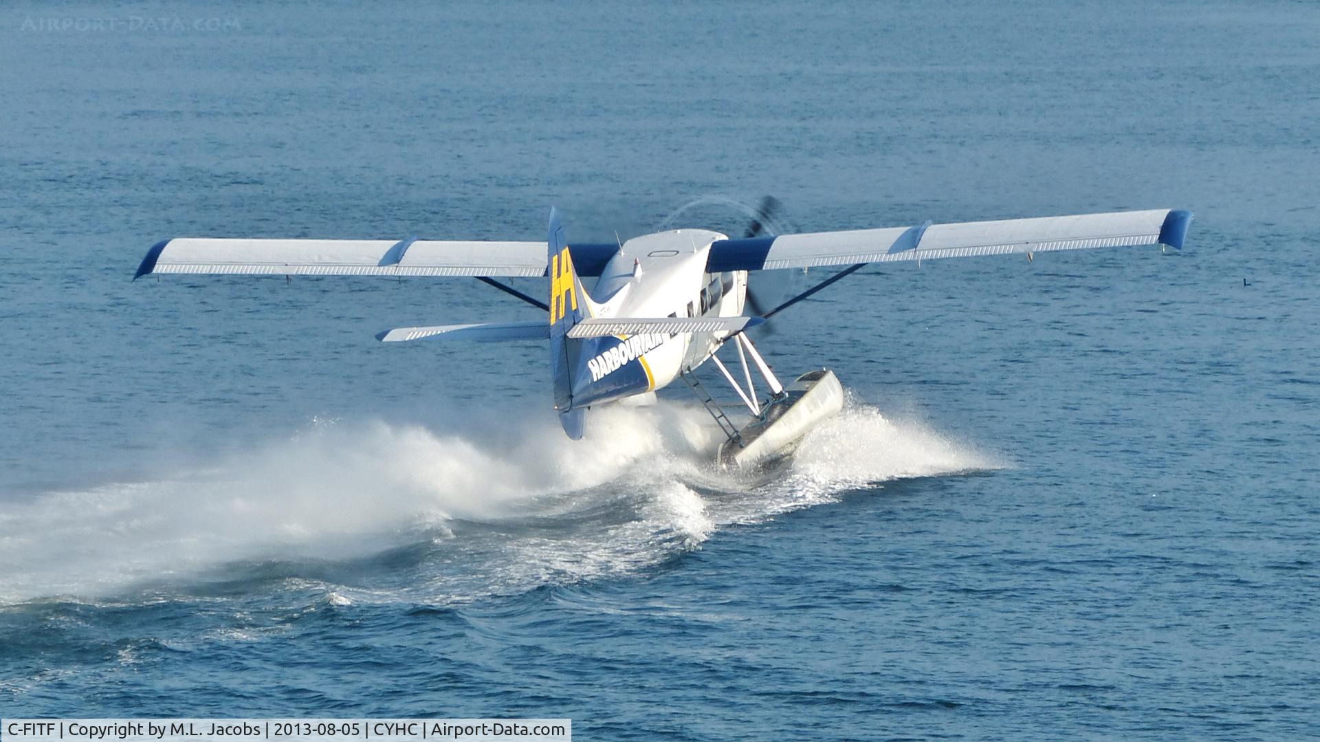 C-FITF, 1955 De Havilland Canada DHC-3T Vazar Turbine Otter C/N 89, Harbour Air #303 taking off in Coal Harbour.