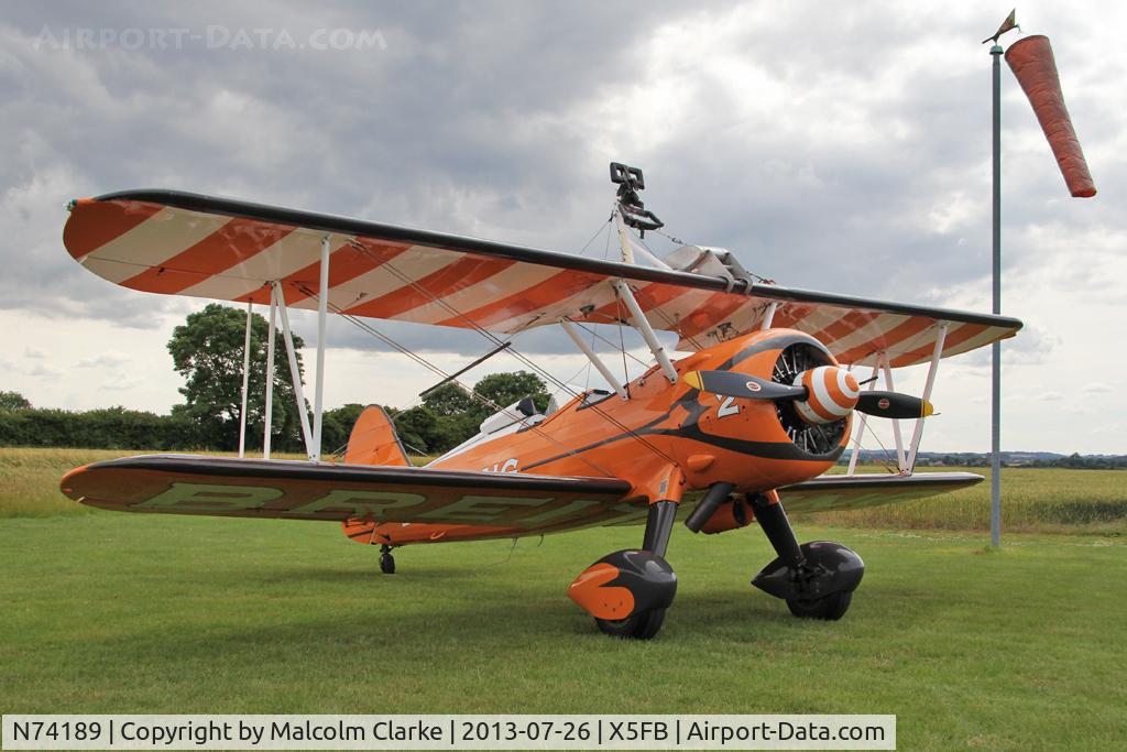 N74189, 1941 Boeing PT-17/R985 Kaydet (A75N1) C/N 75-717, Stearman PT-17-R985 Kaydet (A75N1) during a re-fuelling stop at Fishburn Airfield, July 2013.