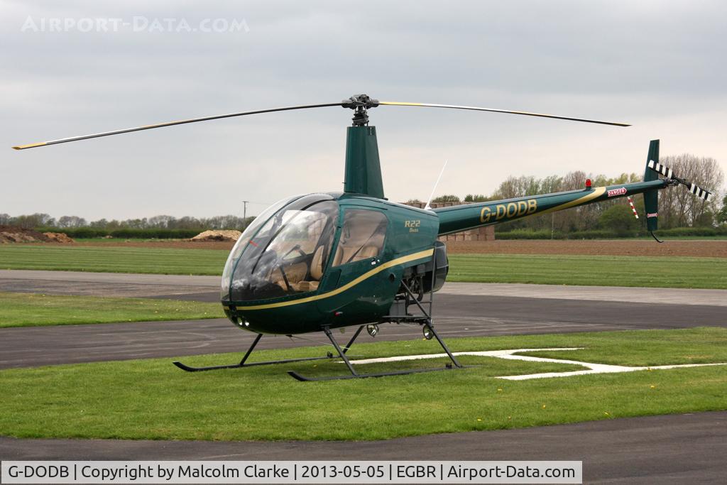 G-DODB, 1988 Robinson R22 Beta C/N 0911, Robinson R22 Beta at The May-hem Fly-In, Breighton Airfield, May 2013.