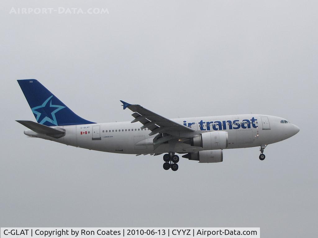 C-GLAT, 1991 Airbus A310-308 C/N 588, This Air Transat Airbus 310-308 prepares to land on runway 23 on a very overcast day at Toronto Int'l Airport (YYZ)