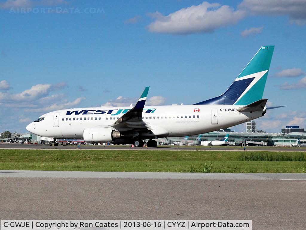 C-GWJE, 2007 Boeing 737-7CT C/N 35078, This 2007 Westjet Boeing 737-7CT is heading for runway 23 at Toronto Int'l Airport (YYZ)