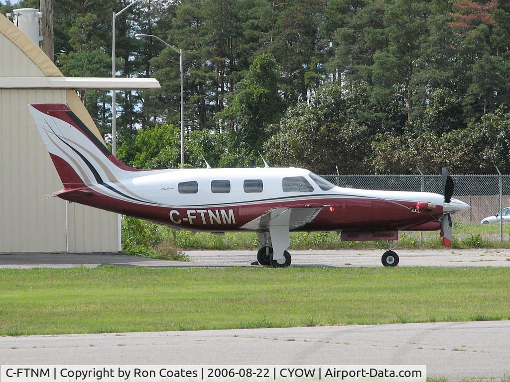 C-FTNM, 1986 Piper PA-46-310P Malibu Malibu C/N 46-08034, This 1986 Piper PA46-310P sits lonely outside it's hanger at Ottawa's MacDonald-Cartier Int'l Airport (CYOW)
