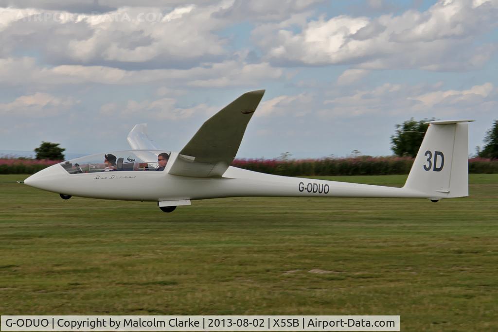 G-ODUO, Schempp-Hirth Duo Discus C/N 29, Schempp-Hirth Duo Discus being launched for a cross country flight during The Northern Regional Gliding Competition, Sutton Bank, North Yorks, August 2nd 2013.