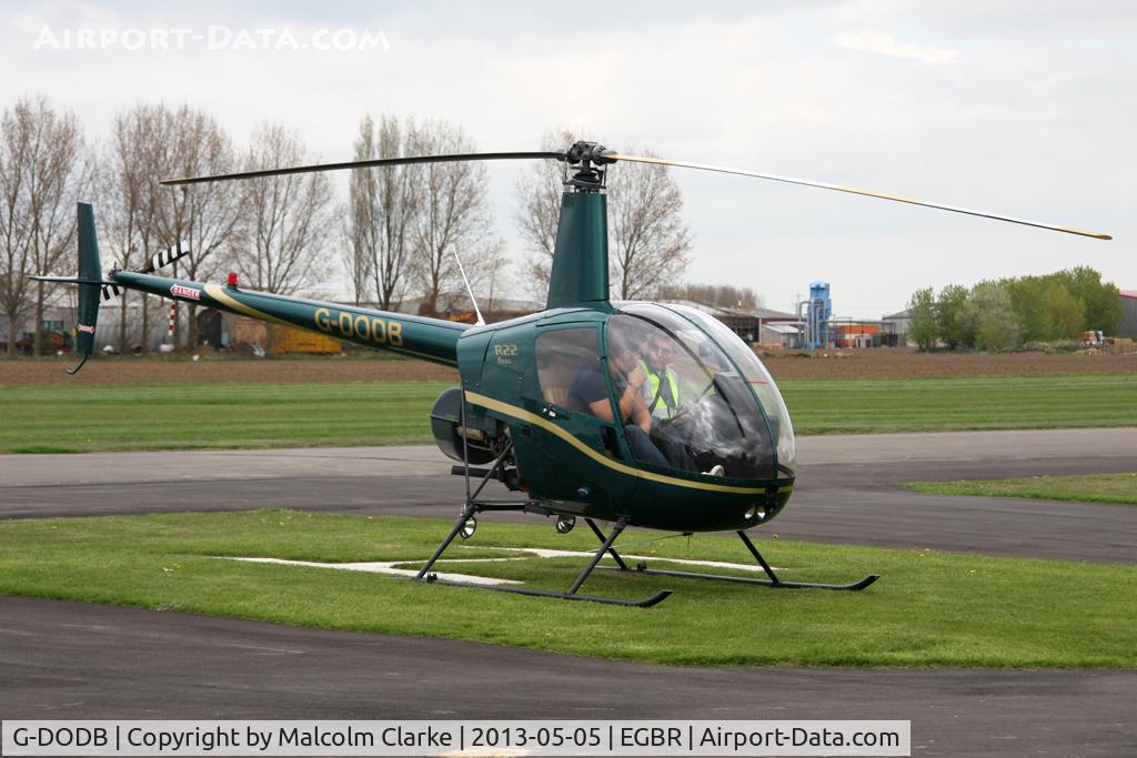 G-DODB, 1988 Robinson R22 Beta C/N 0911, Robinson R22 Beta at The May-hem Fly-In, Breighton Airfield, May 2013.