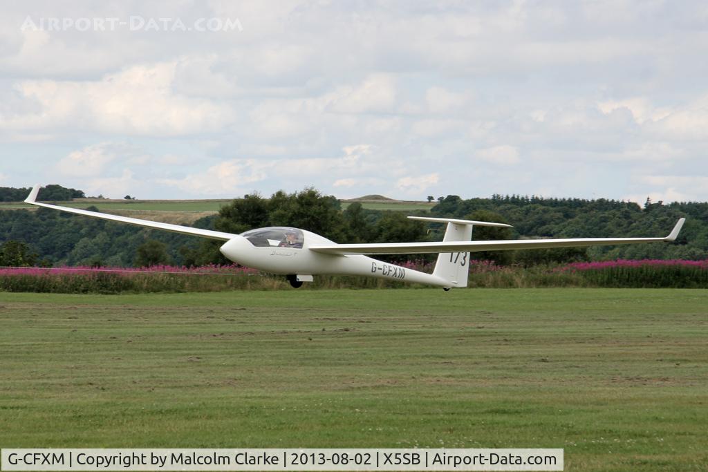 G-CFXM, 1983 Schempp-Hirth Discus bT C/N 16, Schempp-Hirth Discus BT being launched for a cross country flight during The Northern Regional Gliding Competition, Sutton Bank, North Yorks, August 2nd 2013.