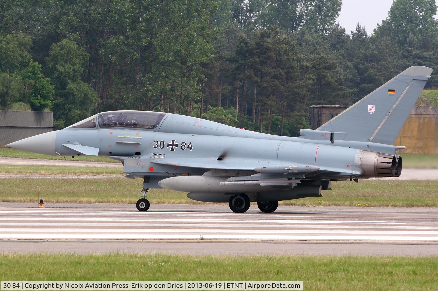 30 84, Eurofighter EF-2000 Typhoon T C/N GT021, 3084 seen here leaving the runway