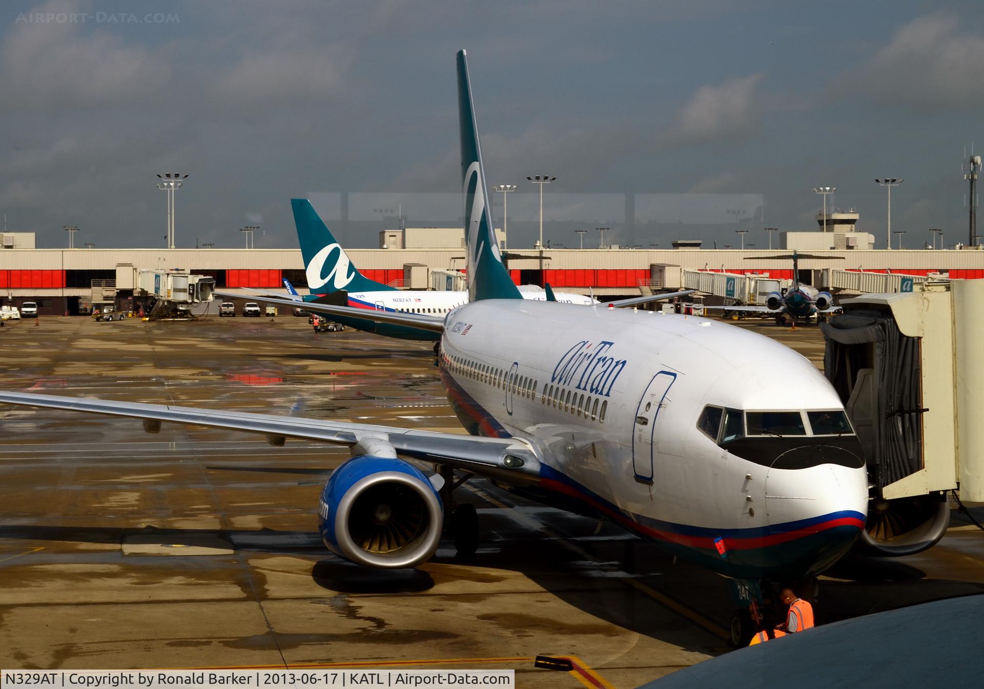 N329AT, 2007 Boeing 737-7BD C/N 36091, At the gate ATL 