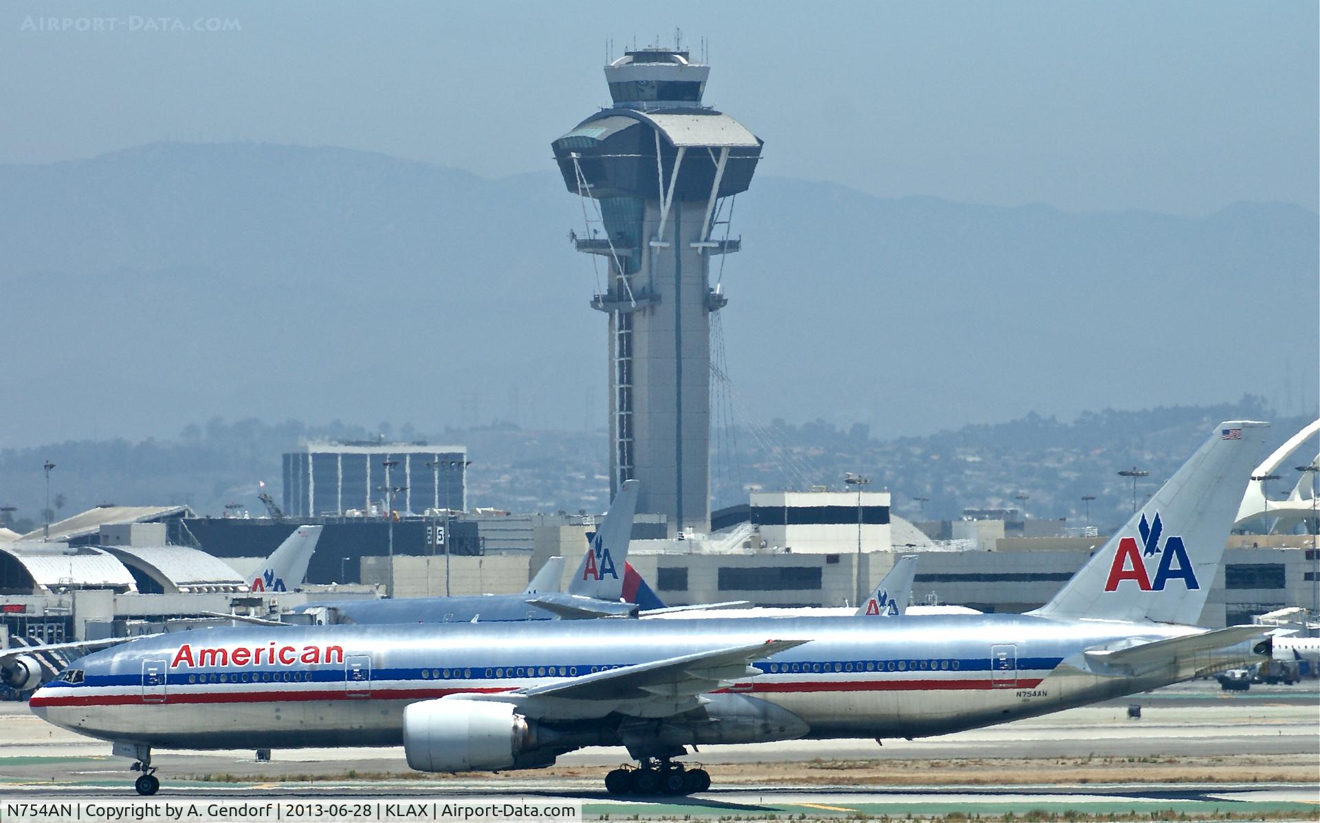 N754AN, 2001 Boeing 777-223 C/N 30262, American Airlines, seen here in front of the tower at Los Angeles Int´l(KLAX)