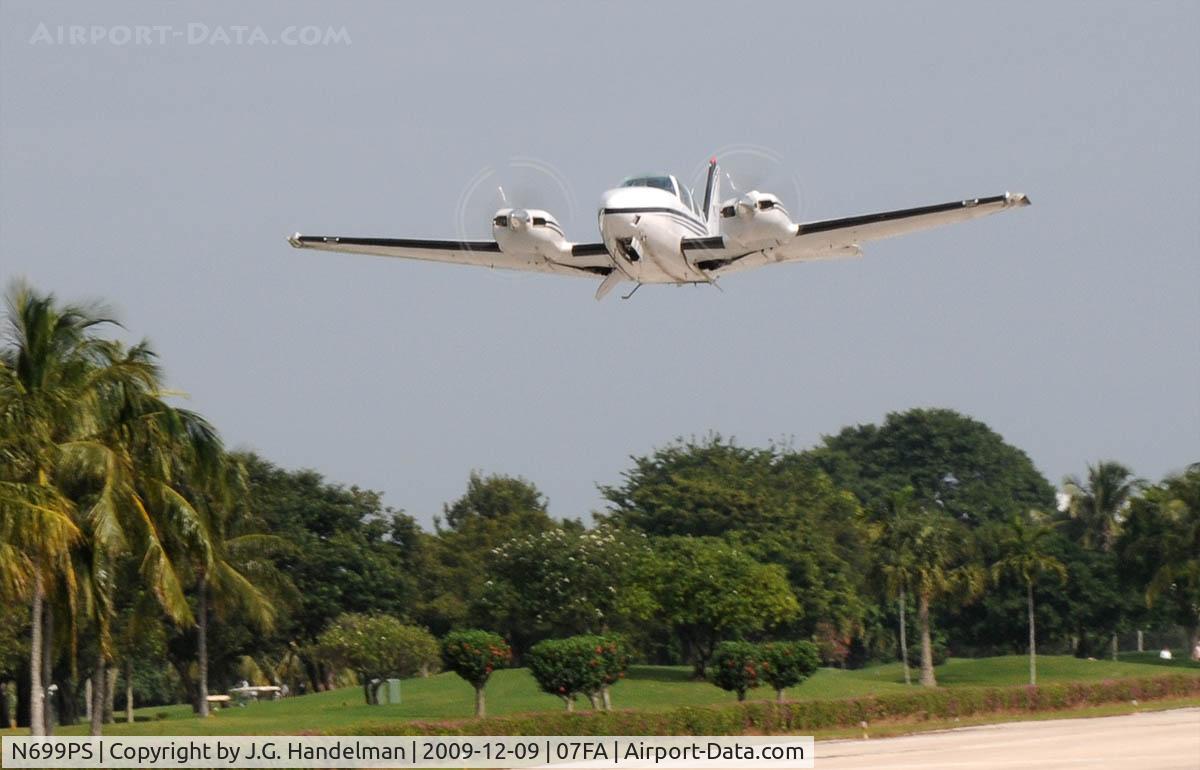 N699PS, 1998 Raytheon Aircraft Company 58 C/N TH-1856, Take Off at Ocean Reef Club.