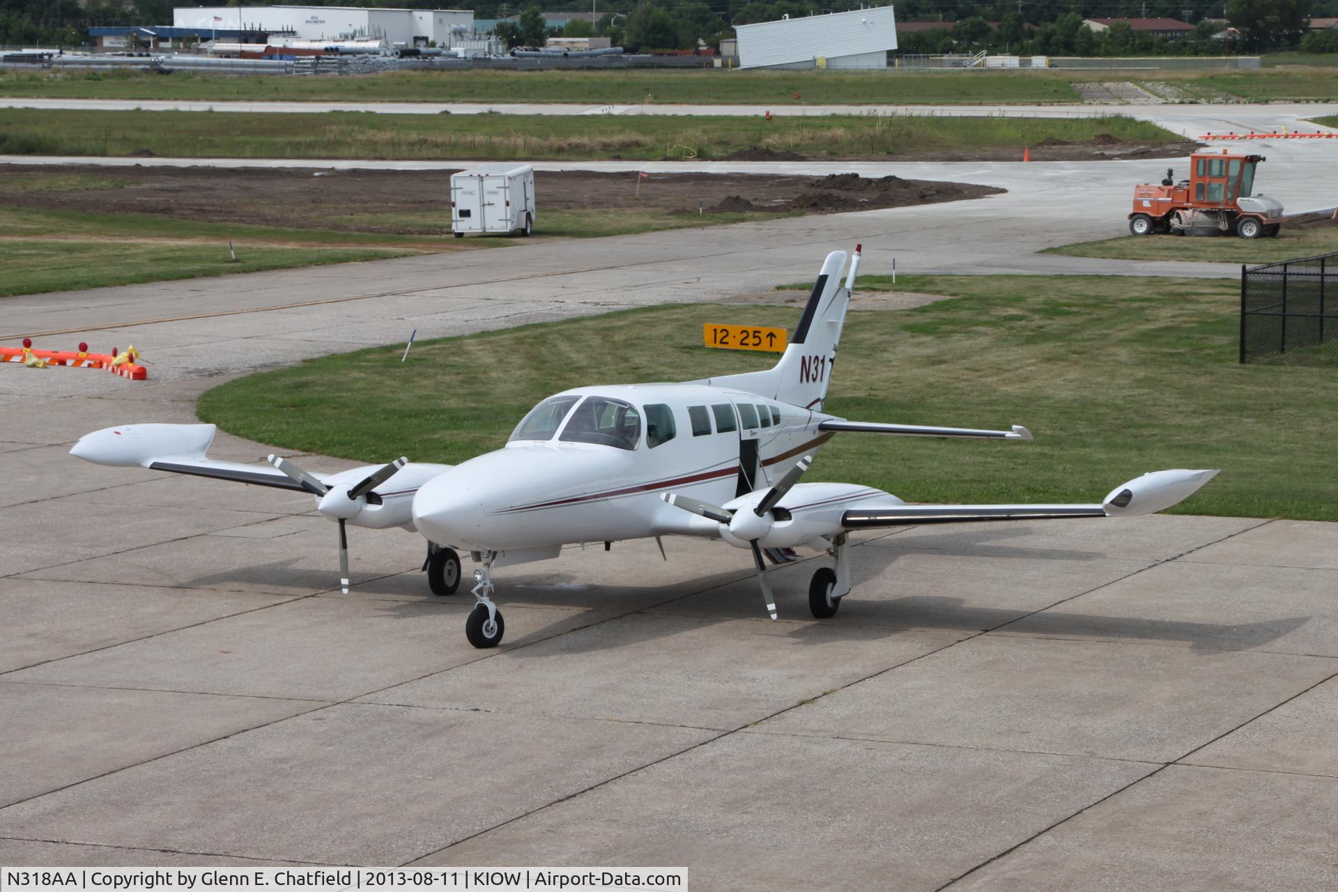 N318AA, 1975 Cessna 402B C/N 402B0854, Seen from the viewing point above the terminal.