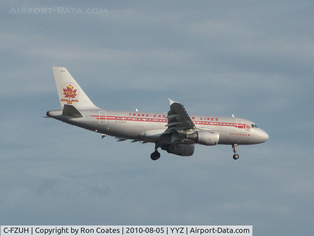 C-FZUH, 1997 Airbus A319-114 C/N 711, This Airbus  A319-114 operated by Air Canada and painted in the colors of Trans Canada Airlines (TCA) prepares to land on 24R at Toronto Int'l Airport.  Brings back old memories.