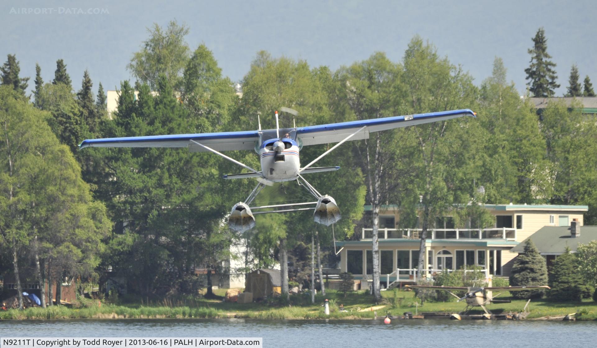 N9211T, 1960 Cessna 180C C/N 50711, Landing at Lake Hood