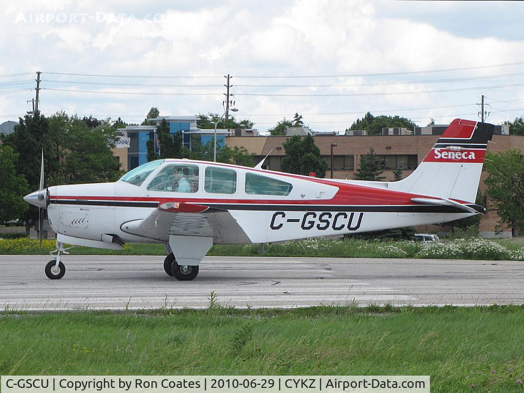 C-GSCU, 1992 Beech F33A Bonanza C/N CE-1695, This 1992 Beech Bonanza of the Seneca College Flying School waiting to be cleared off runway 33 at Buttonville Airport (CYKZ)