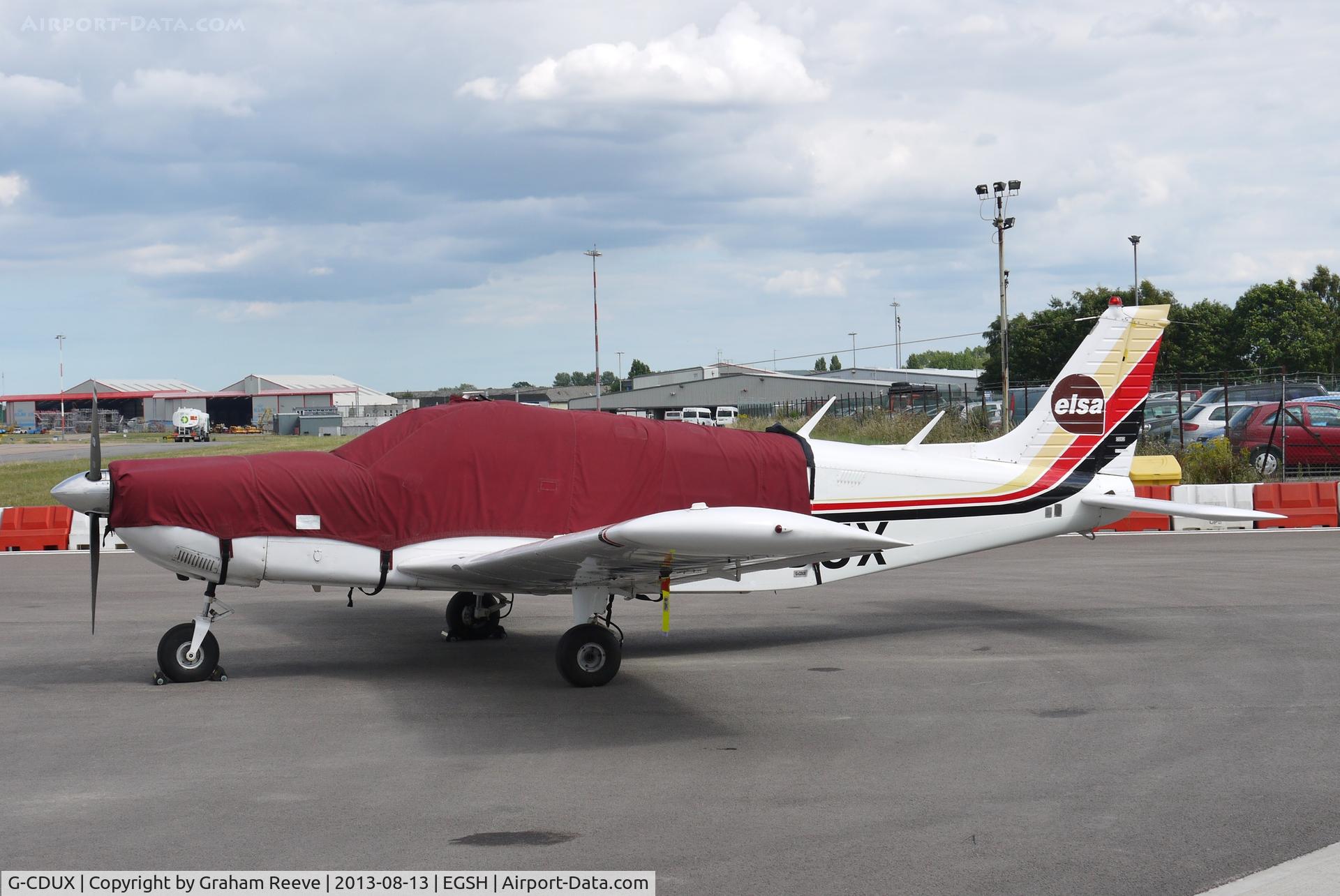 G-CDUX, 1973 Piper PA-32-300 Cherokee Six Cherokee Six C/N 32-7340074, Under covers at Norwich.