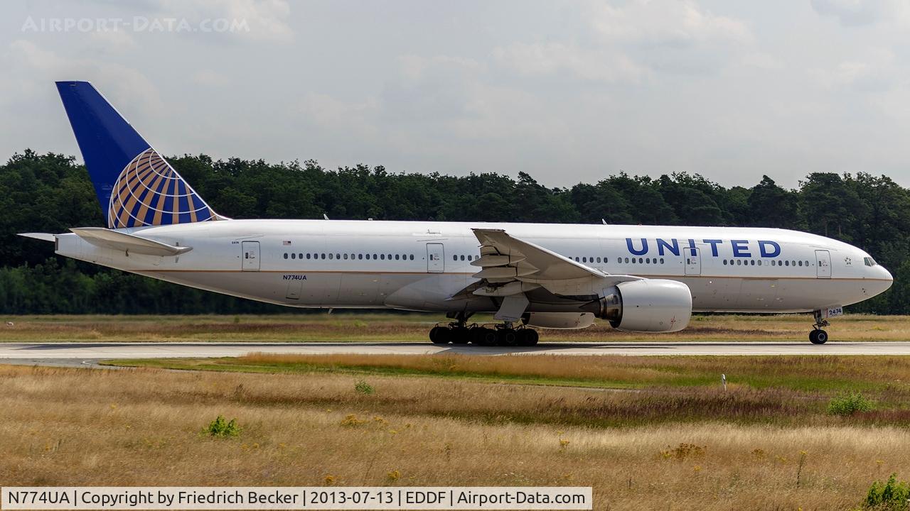 N774UA, 1996 Boeing 777-222 C/N 26936, departure via RW18W