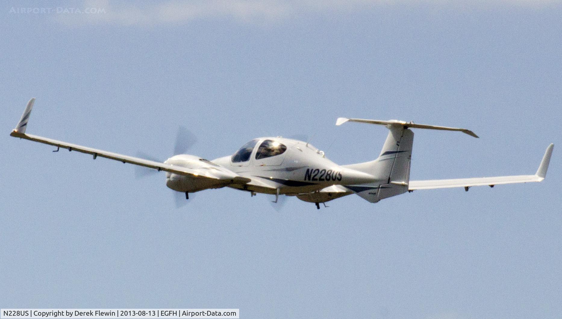 N228US, 2008 Diamond DA-42 Twin Star C/N 42.347, Diamond DA 42 pulling out from runway 22 at EGFH en route to Cannes France.