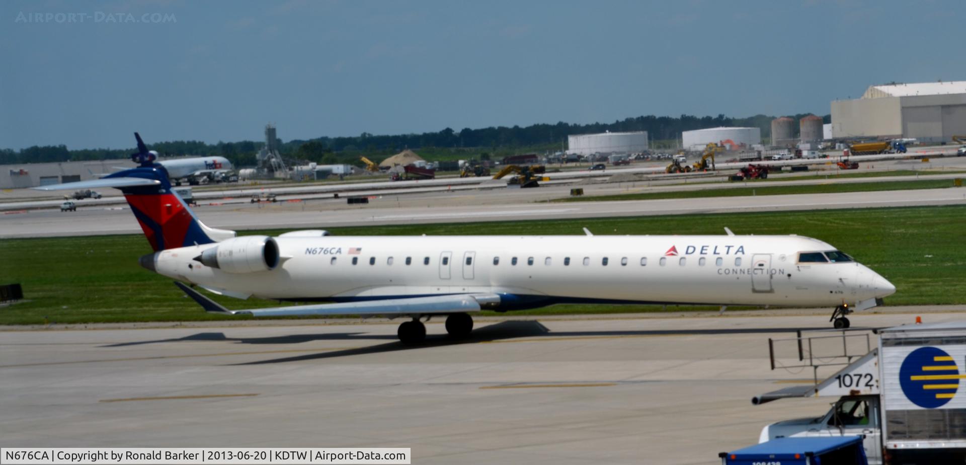 N676CA, 2007 Bombardier CRJ-900ER (CL-600-2D24) C/N 15127, Taxi Detroit