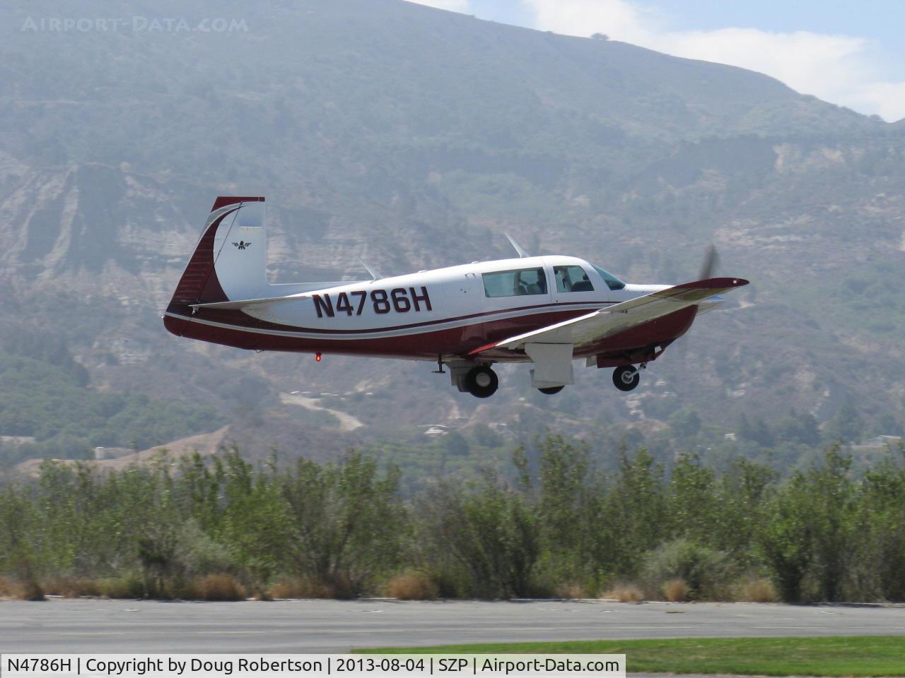 N4786H, 1979 Mooney M20J 201 C/N 24-0876, 1979 Mooney M20J 201, Lycoming IO-360-A&C 200 Hp, fast takeoff climb Rwy 22, suckin' em up