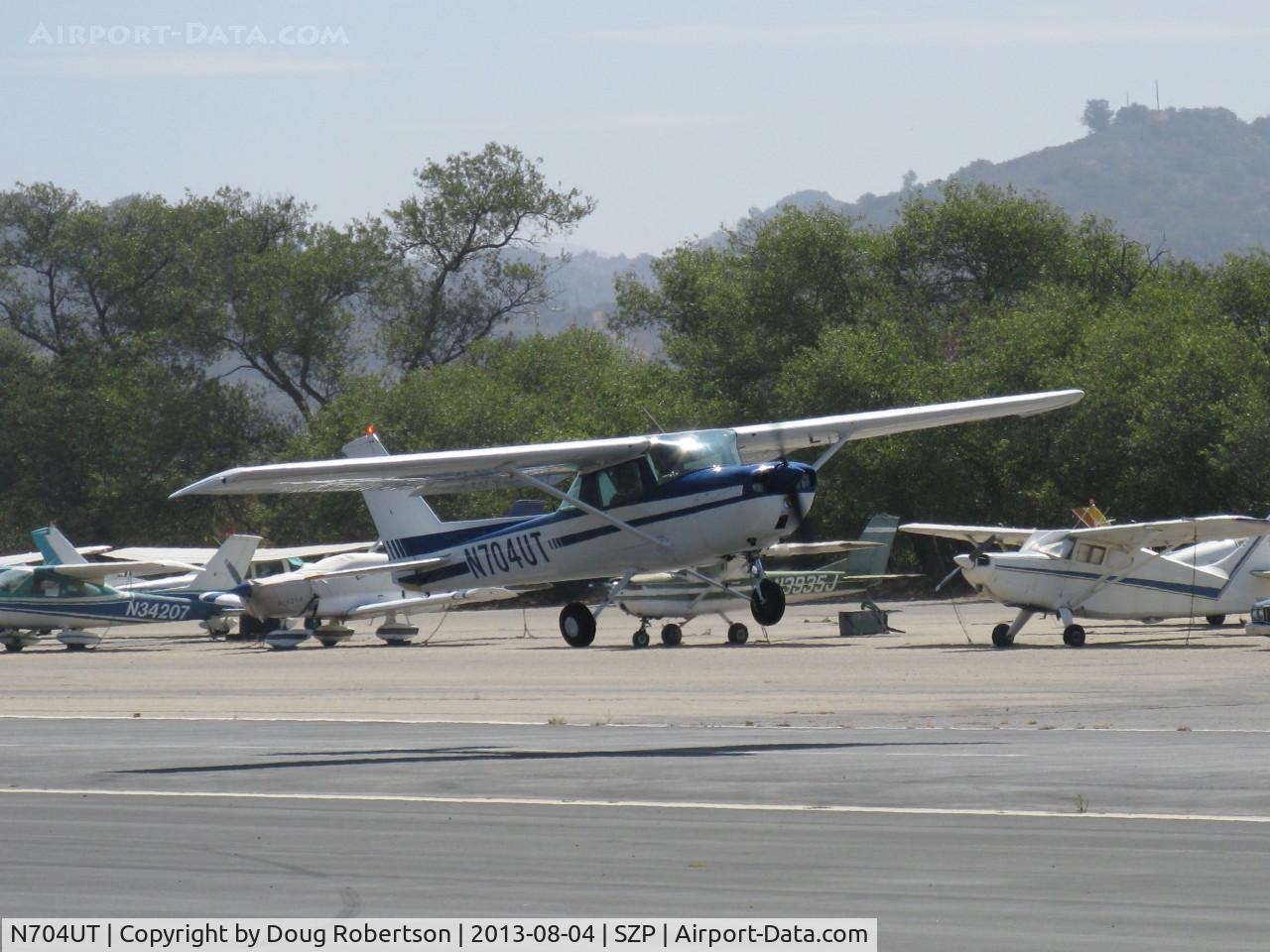 N704UT, 1976 Cessna 150M C/N 15078891, 1976 Cessna 150M, Continental O-200 100 Hp, another takeoff climb Rwy 22