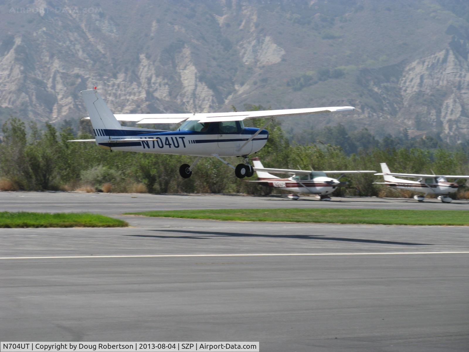 N704UT, 1976 Cessna 150M C/N 15078891, 1976 Cessna 150M, Continental O-200 100 Hp, takeoff climb Rwy 22