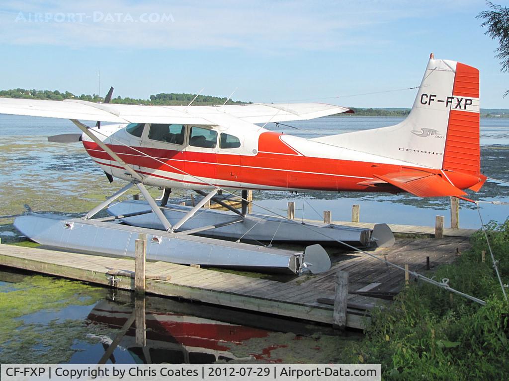 CF-FXP, 1971 Cessna A185E Skywagon 185 C/N 18501880, This fire red Cessna looked great while resting at its home dock on Lake Scugog near Port Perry, Ontario. It must be loud when taking off among the small fishing boats.