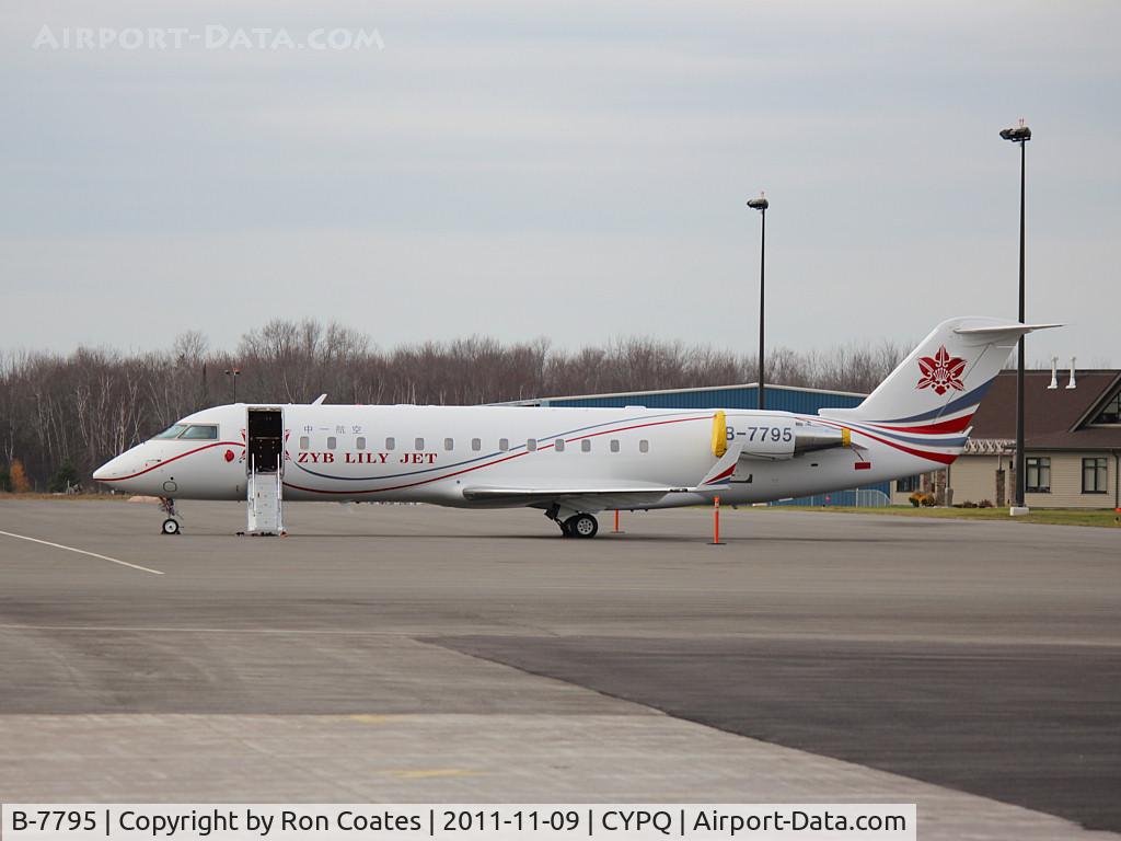 B-7795, 2008 Bombardier Challenger 850 (CL-600-2B19) C/N 8098, This Canadair Challenger 850 sits on the ramp at the Peterborough Airport the home of Flying Colors