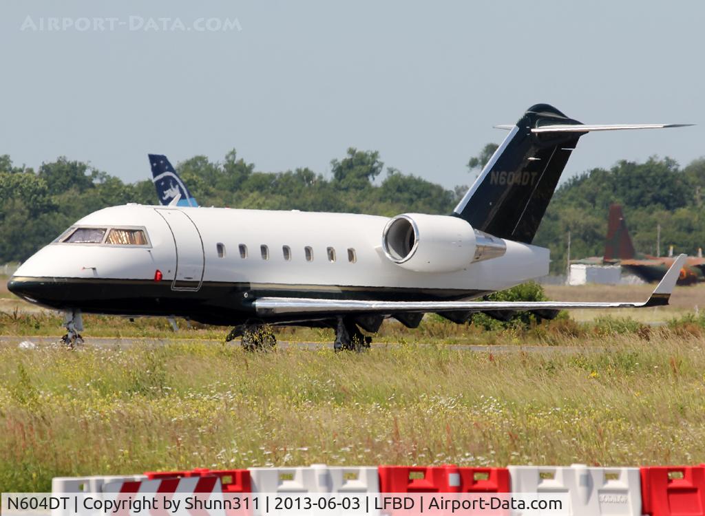 N604DT, 2005 Bombardier Challenger 604 (CL-600-2B16) C/N 5627, Parked at the General Aviation area...