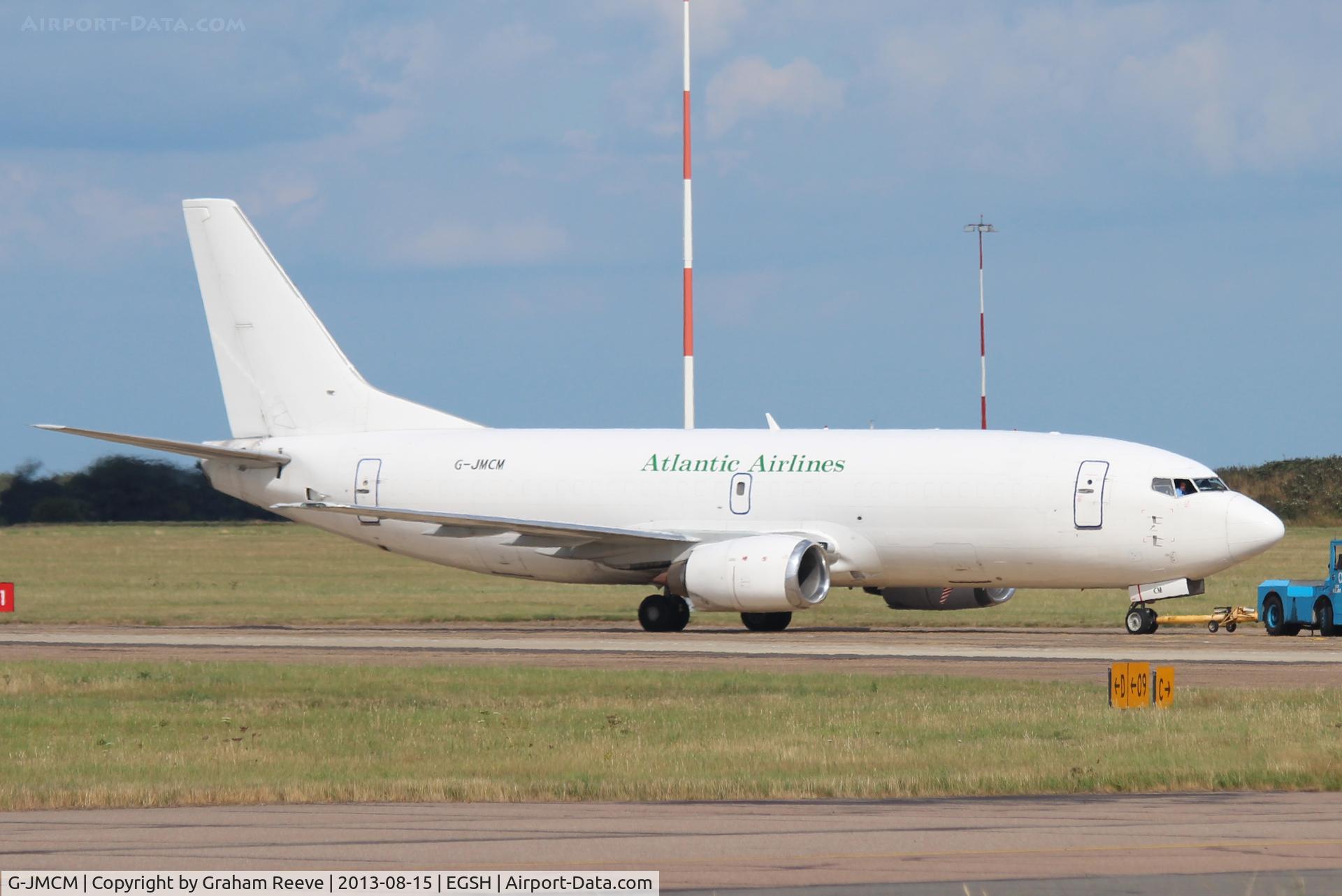 G-JMCM, 1990 Boeing 737-3Y0/SF C/N 24679, Under tow at Norwich.
