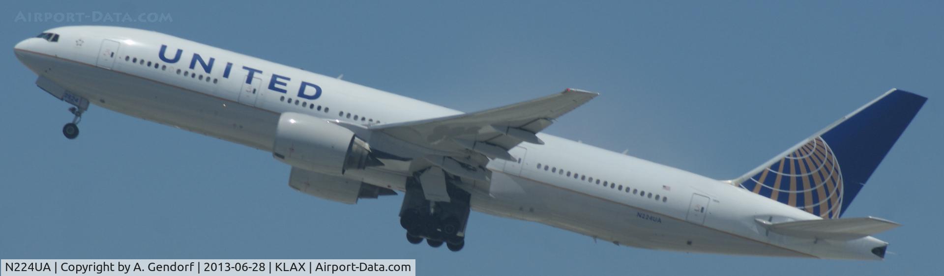N224UA, 2001 Boeing 777-222 C/N 30225, United, is climbing into blue skies after take off at Los angeles Int´l(KLAX)