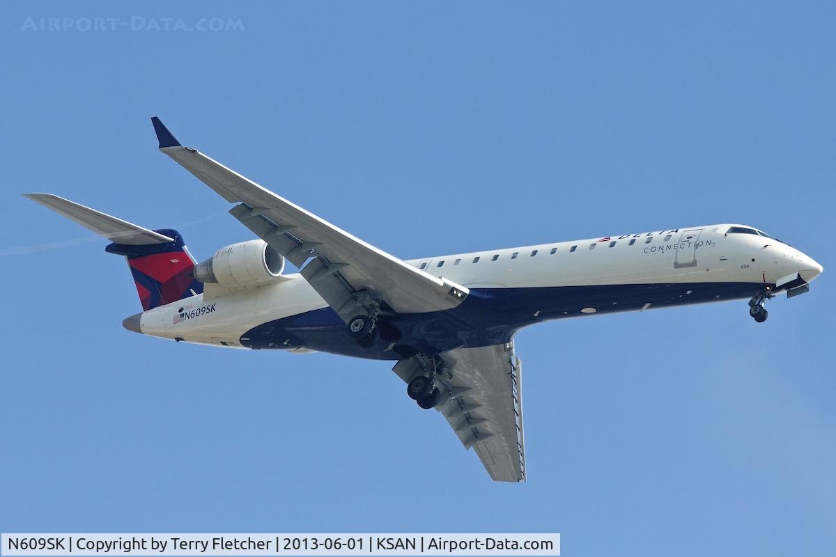N609SK, 2002 Bombardier CRJ-701 (CL-600-2C10) Regional Jet C/N 10020, Overhead Balboa Park on approach to San Diego International , California