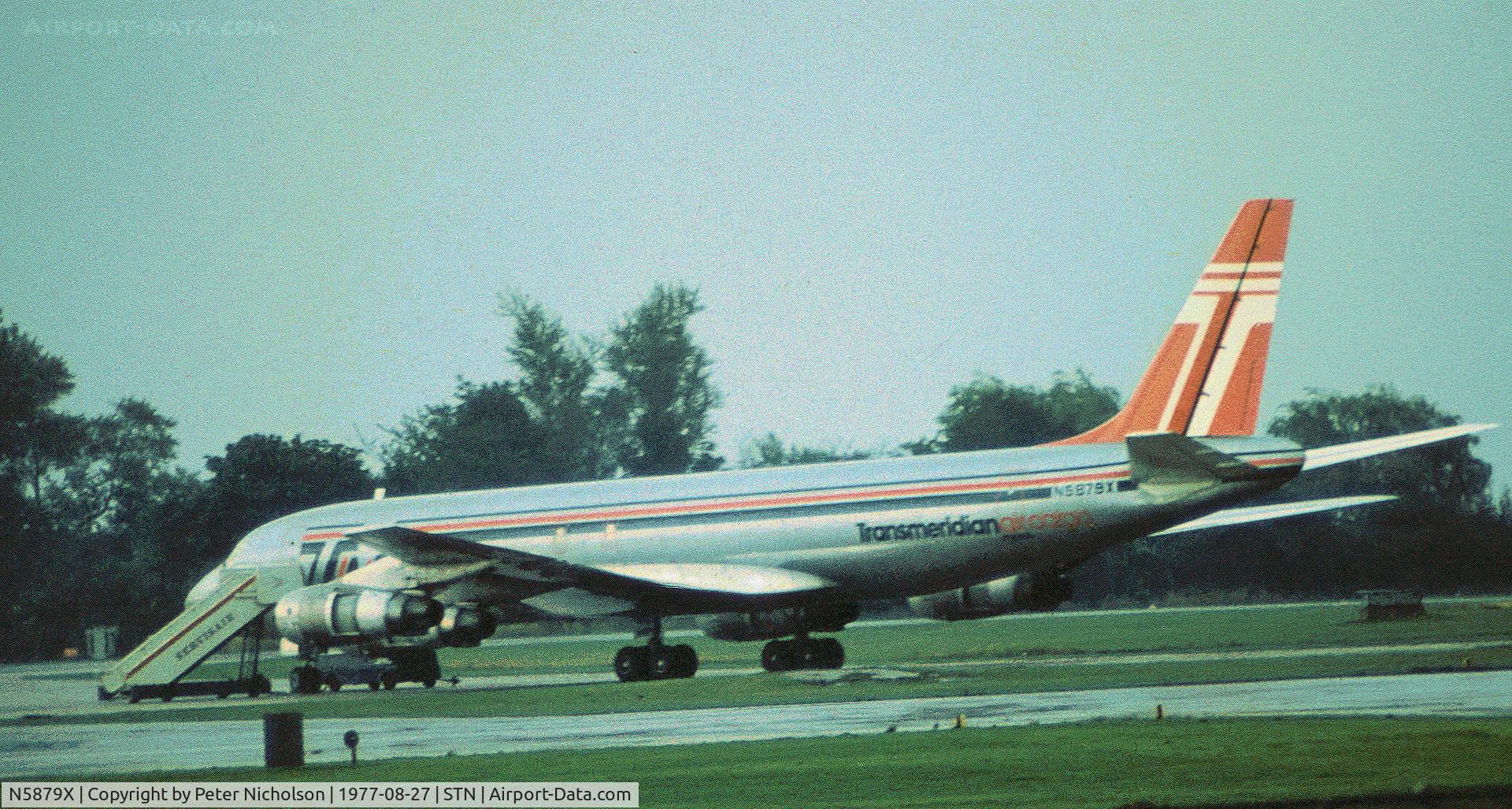 N5879X, 1966 Douglas DC-8-54F C/N 45879, DC-8F-54 of Transmeridian Air Cargo seen at their Stansted base in the Summer of 1977.