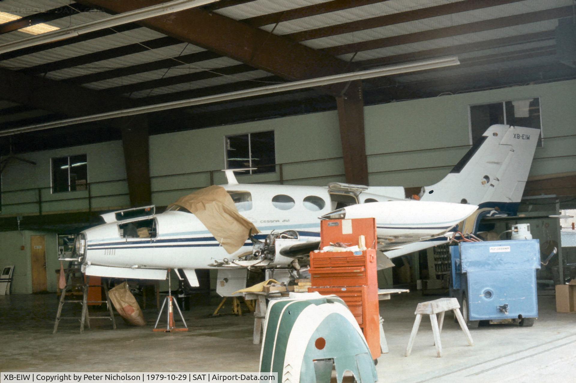 XB-EIW, 1974 Cessna 414 Chancellor C/N 4140500, Cessna 414 undergoing maintenance at San Antonio in October 1979.