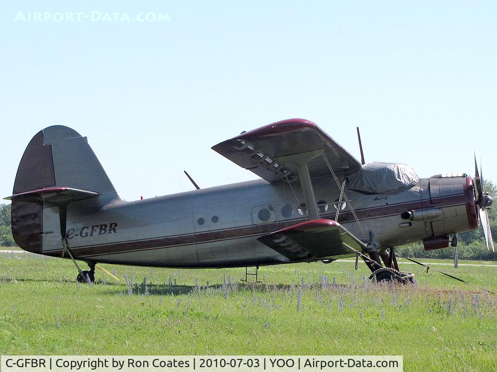 C-GFBR, 1990 Antonov An-2P C/N 1G 238-52, This Polish built 1990 Antonov AN-2P, sits tied down near a taxiway at Oshawa Airport in Ontario (CYOO)