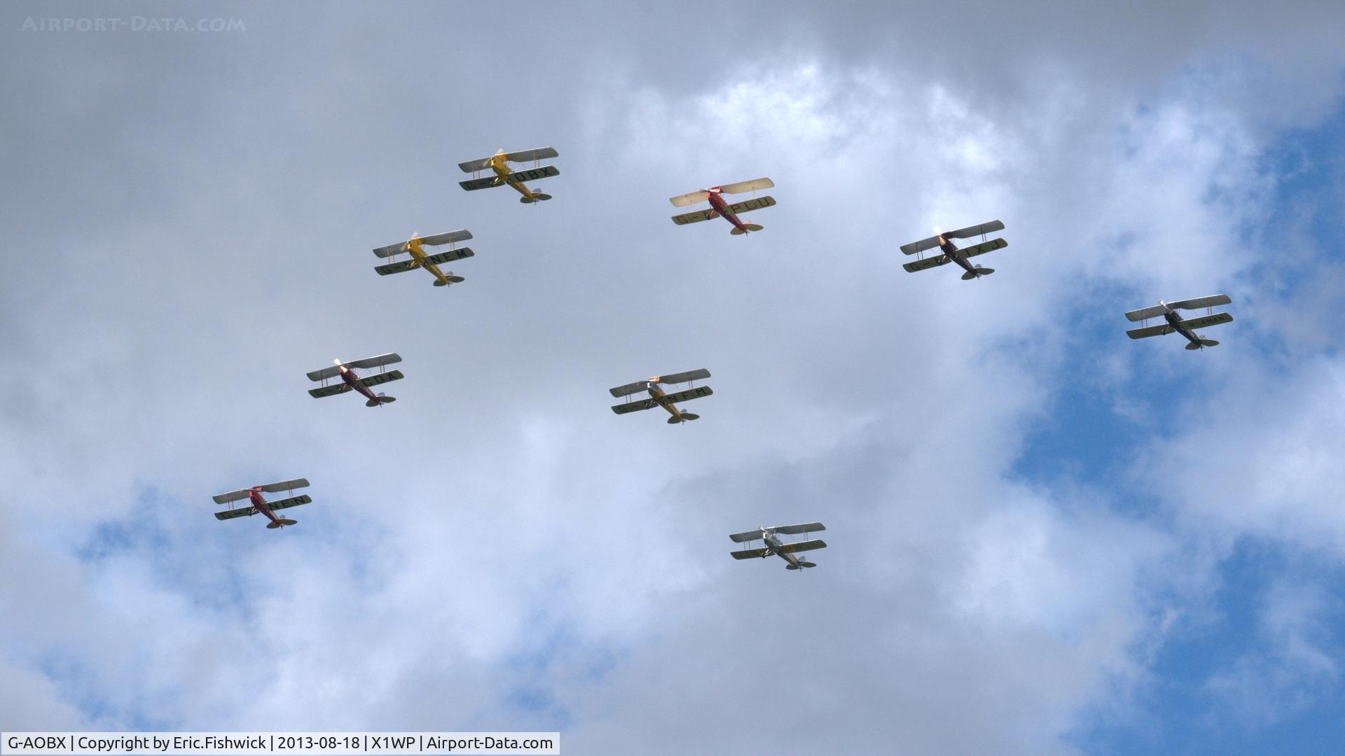 G-AOBX, 1940 De Havilland DH-82A Tiger Moth II C/N 83653, 45. G-AOBX leading the Tiger 9 Formation Display Team at The 28th. International Moth Rally at Woburn Abbey, Aug. 2013.