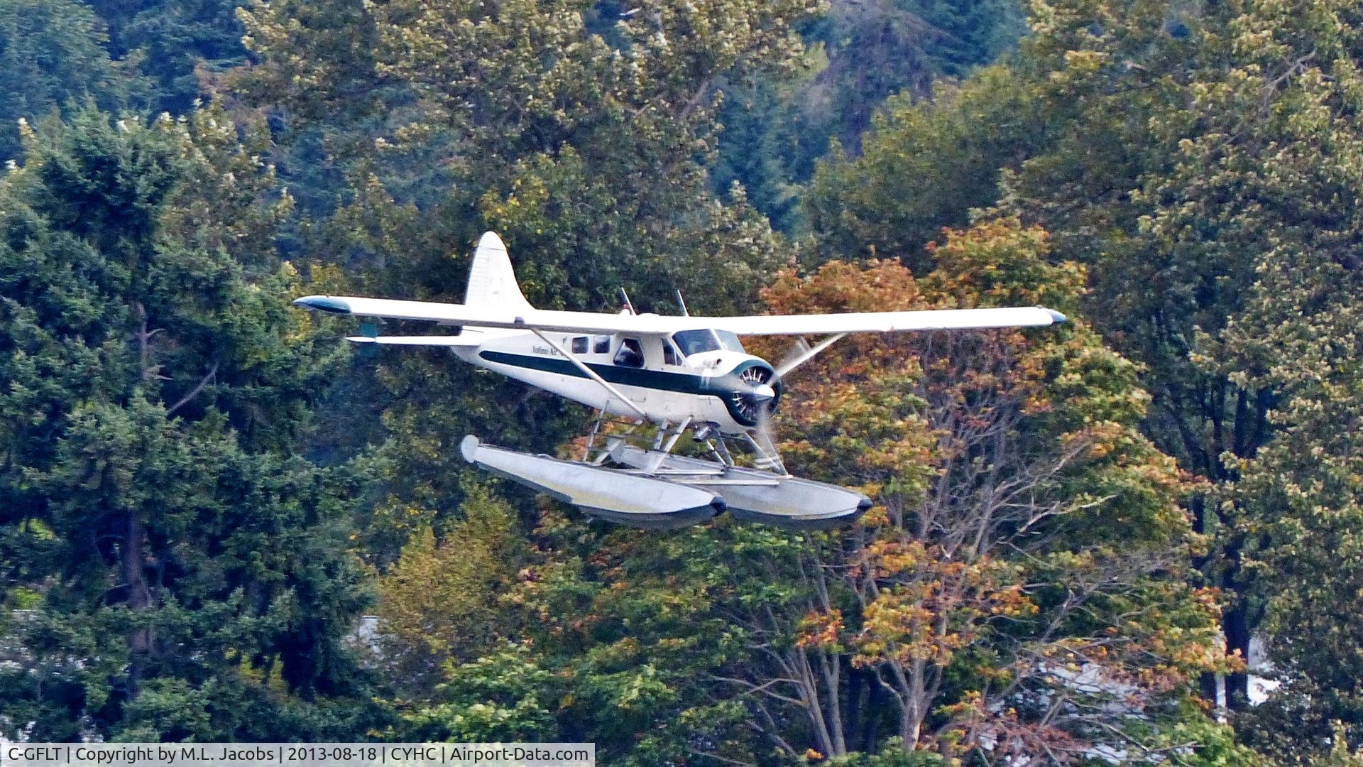 C-GFLT, 1952 De Havilland Canada DHC-2 Beaver C/N 279, Tofino Air coming in over Stanley Park to land in Coal Harbour.