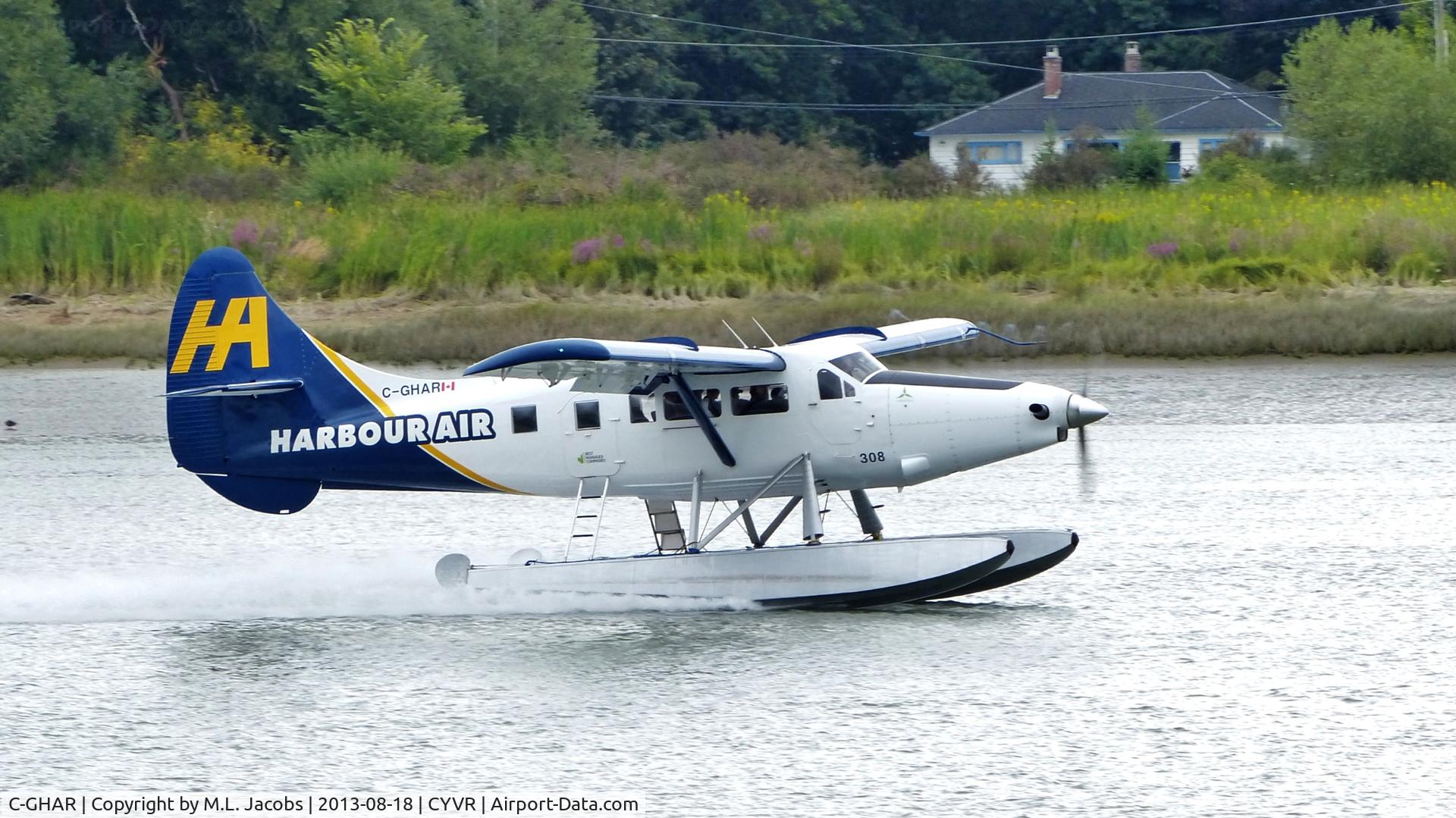 C-GHAR, 1954 De Havilland Canada DHC-3 Otter C/N 42, Harbour Air #308 just landed on the Fraser River.
