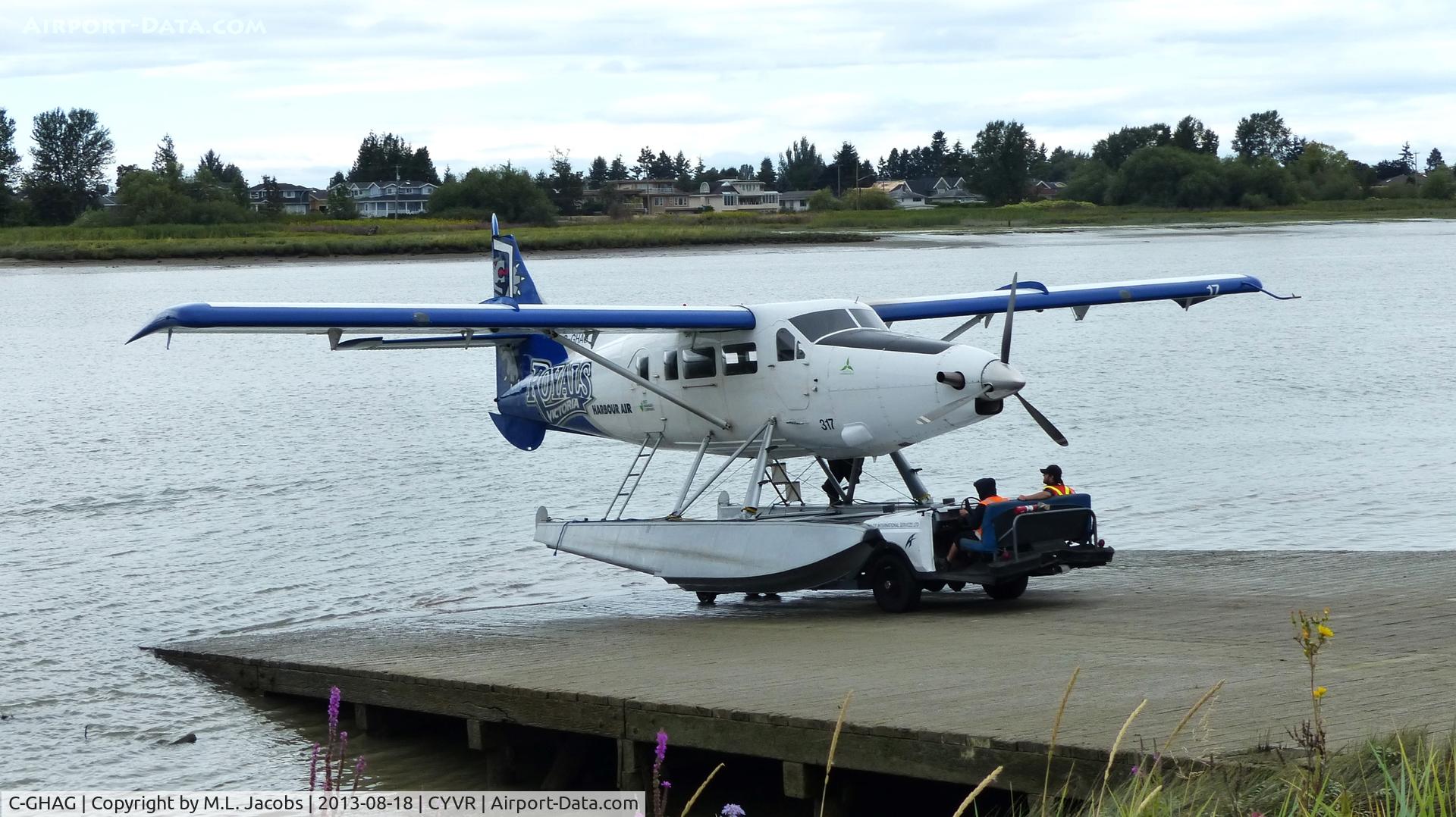 C-GHAG, 1957 De Havilland Canada DHC-3 Turbo Otter C/N 214, Harbour Air #317 wheeled out of the Fraser River  to go to the hangar.