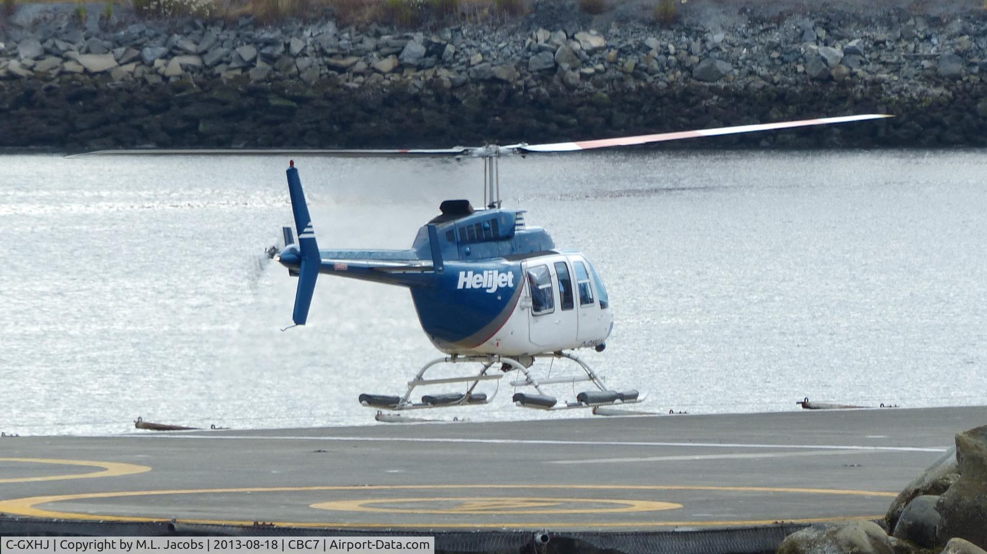 C-GXHJ, 1982 Bell 206L-1 LongRanger II C/N 45741, Lifting off at the Vancouver Harbour Heliport.