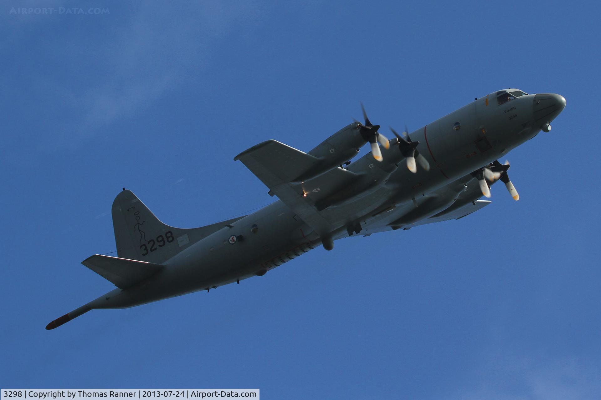 3298, 1989 Lockheed P-3C Orion C/N 285H-5819, RNoAF P-3C Orion performing a low-pass over the City of Vardø.