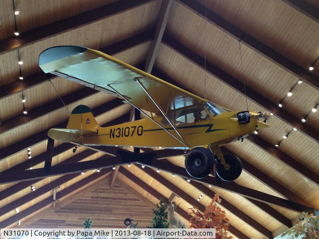 N31070, 1940 Piper J3L-65 Cub C/N 5296, I saw this plane at the Cabela's Store in Green Bay, Wisconsin. It is a real airplane but obviously not flying anymore.