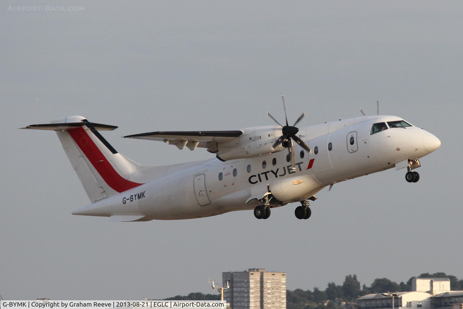 G-BYMK, 1996 Dornier 328-100 C/N 3062, Just taken off.