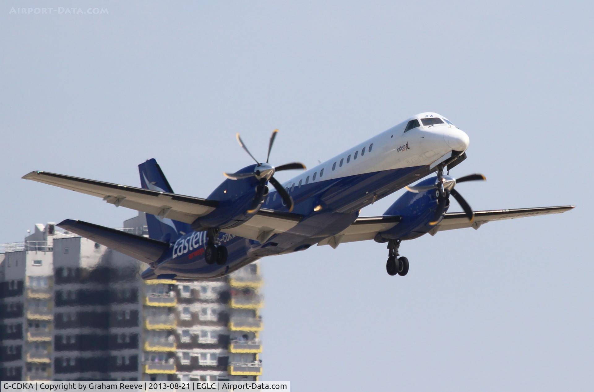 G-CDKA, 1993 Saab 2000 C/N 2000-006, Departing from London City.