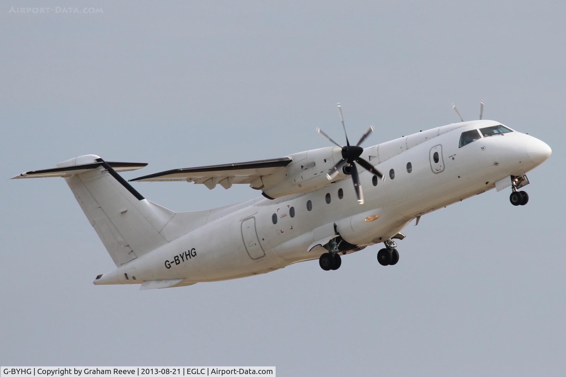 G-BYHG, 1998 Dornier 328-100 C/N 3098, Just taken off from London City.