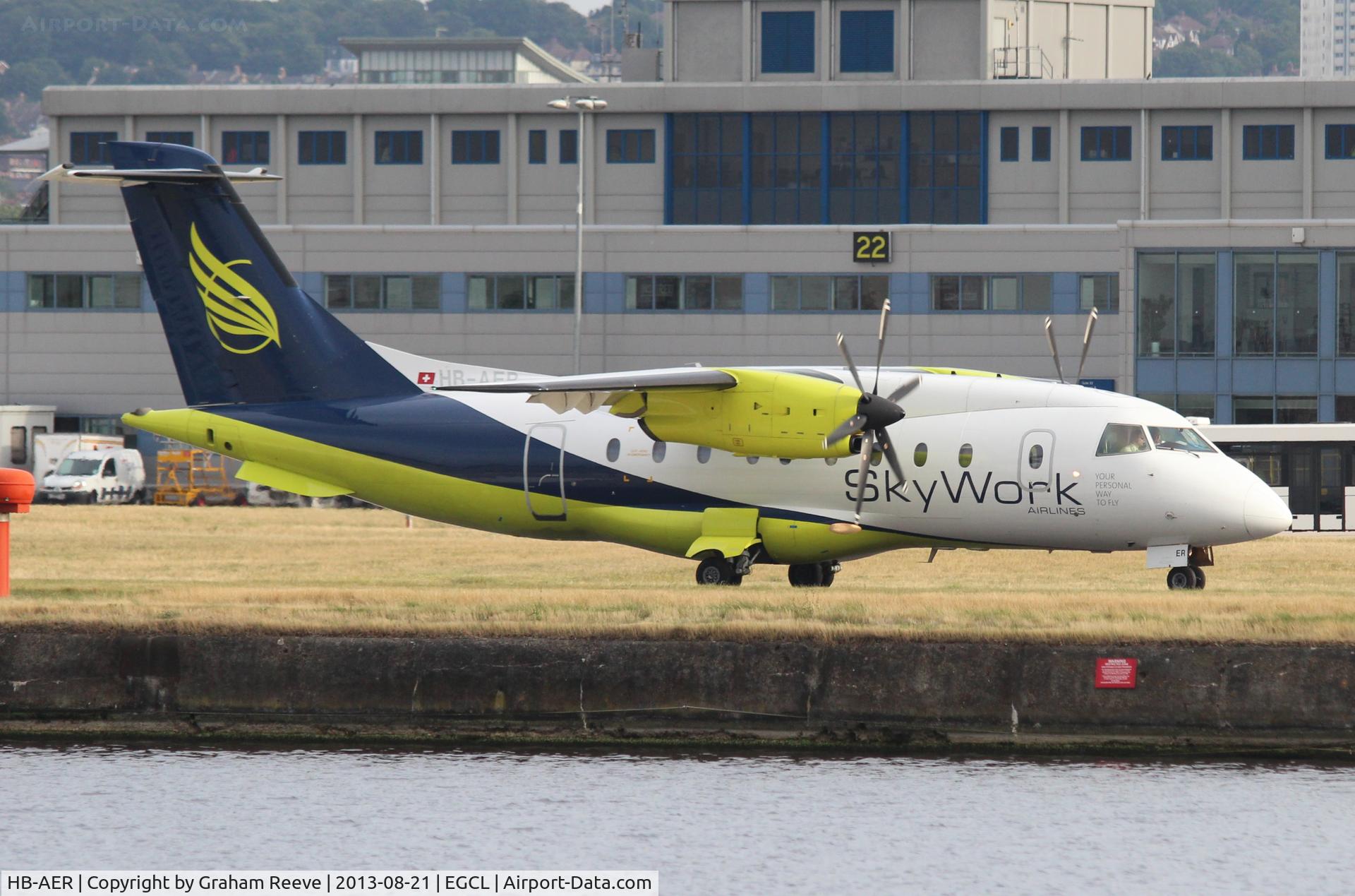 HB-AER, 1996 Dornier 328-110 C/N 3066, Just landed.