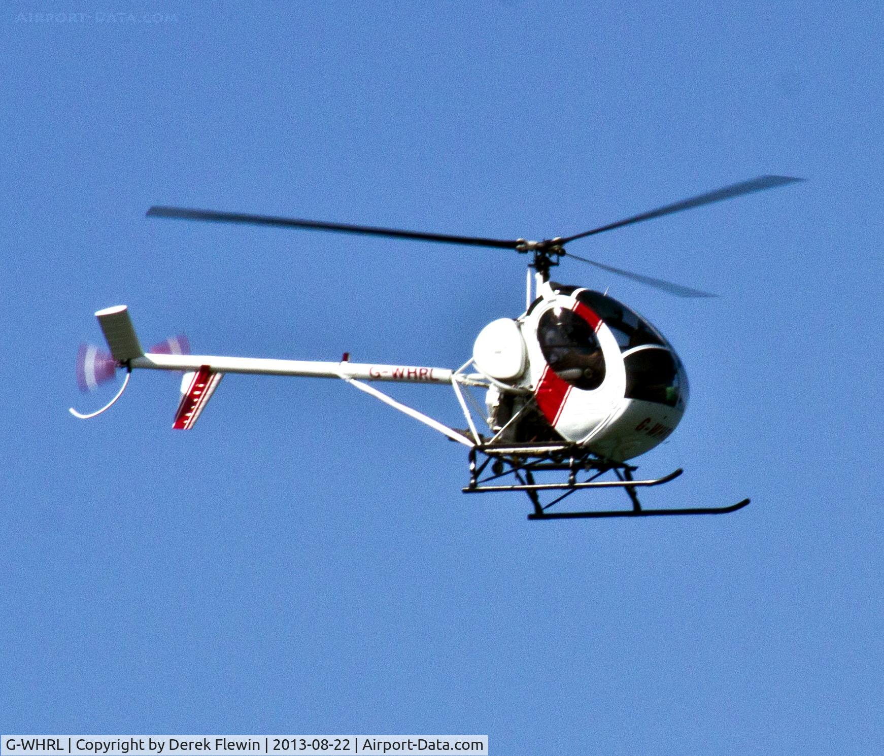G-WHRL, 1990 Schweizer 269C-300 C/N S-1453, Schweizer 269C-300, privately owned EGFP resident overflying the Worms Head, Rhossili area of Gower.