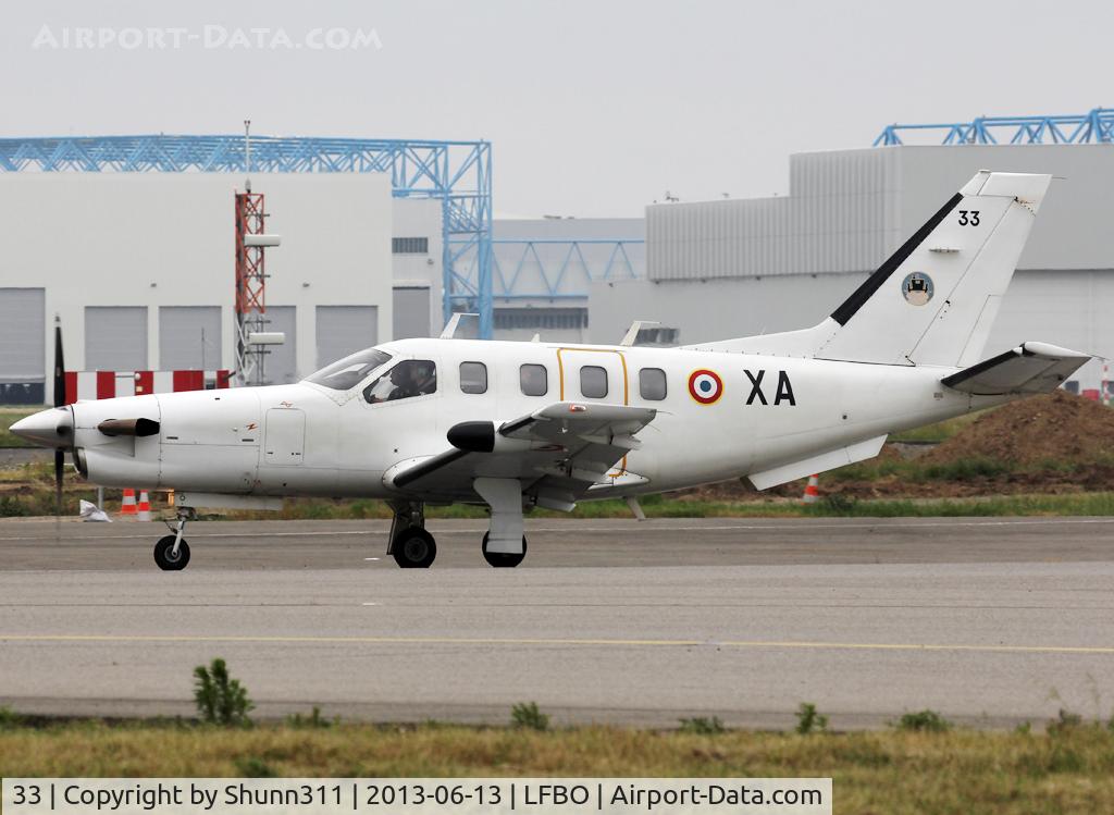 33, Socata TBM-700A C/N 33, Taxiing to the Military area...