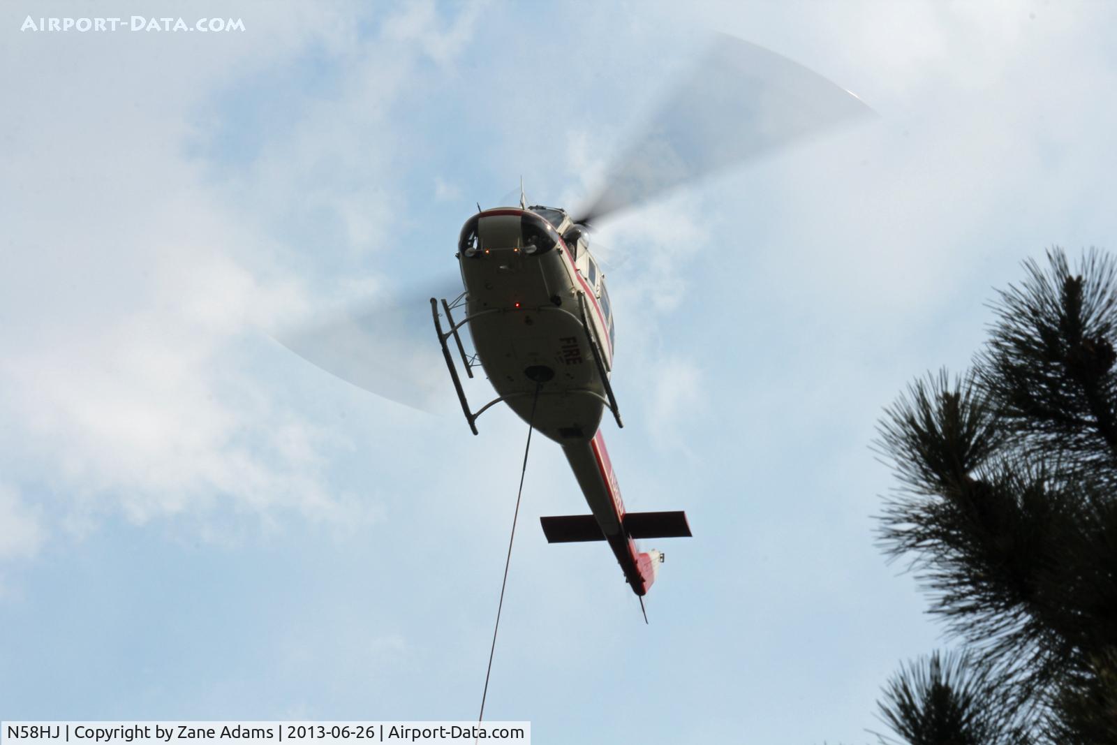 N58HJ, 1980 Bell 205A-1 C/N 30314, Working the Jaroso Fire near Cowles, New Mexico